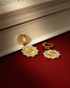 gold-earrings stern